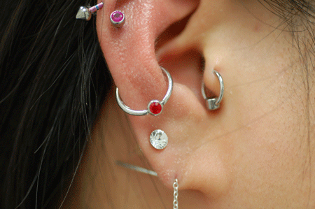 Naomi has got an ecclectic mix of piercings